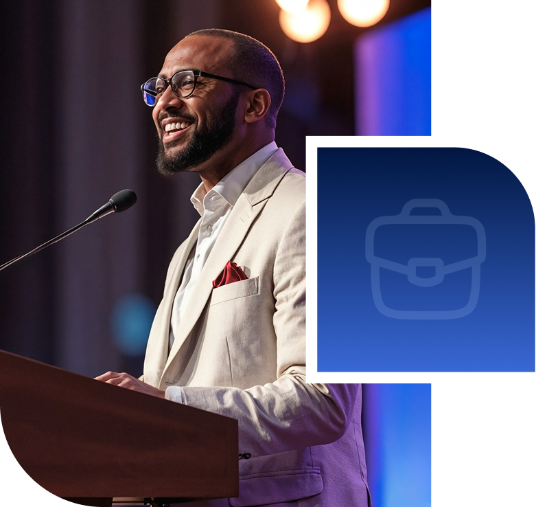 Man at podium smiling